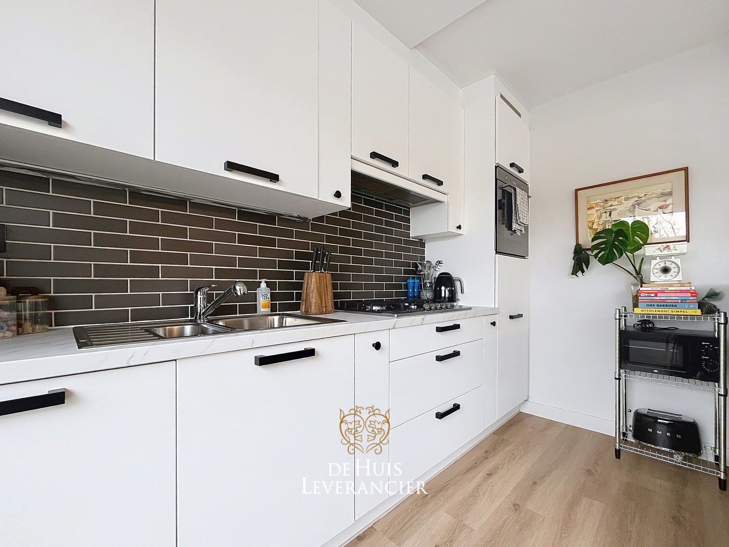 Gerenoveerd appartement met 2 slaapkamers, garagebox en berging te koop in Edegem foto 12