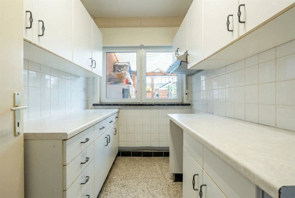 Te renoveren woning met achterliggend weiland foto 5