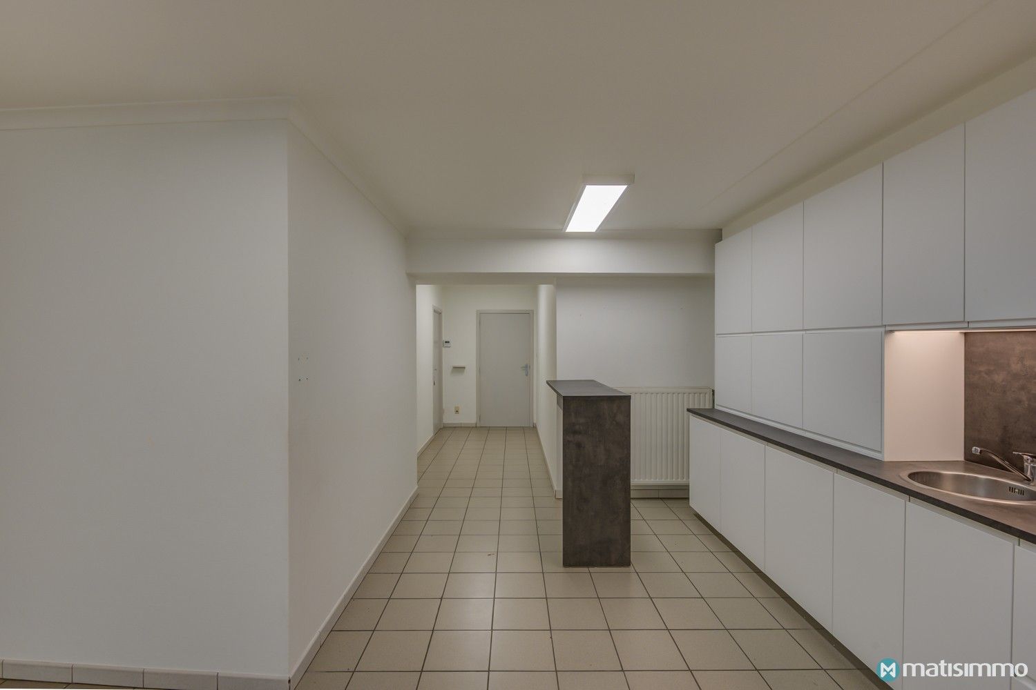 GOED GELEGEN HANDELSRUIMTE MET RIANT WOONGEDEELTE IN CENTRUM VAN HOESELT foto 6