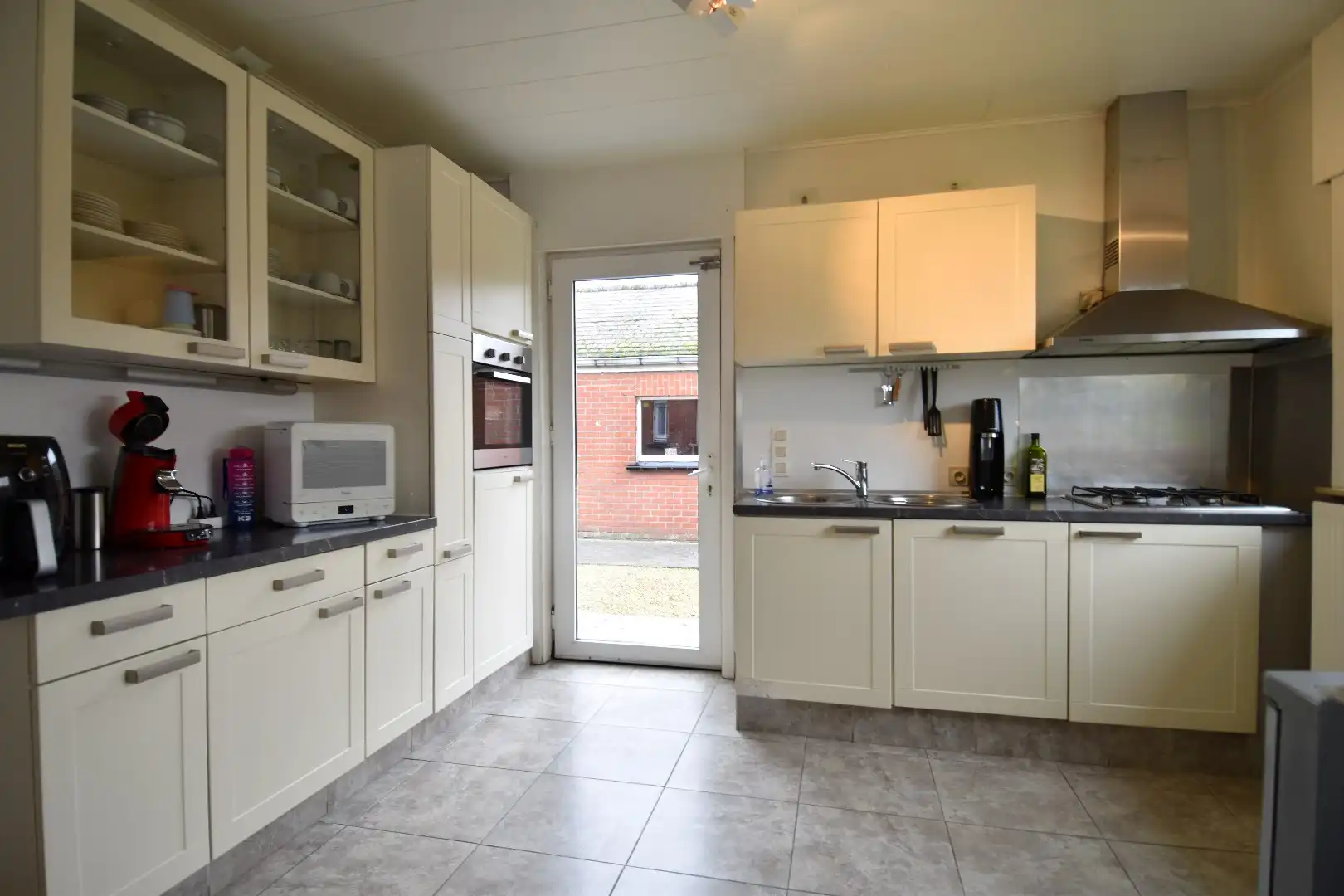 Alleenstaande woning op perceel van 1.062 m² te koop op rustige ligging vlakbij centrum-Gullegem foto 3