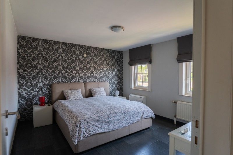 Energiezuinige woonhuis met 3 slaapkamers op een perceel van 6 a en 15 ca. foto 30