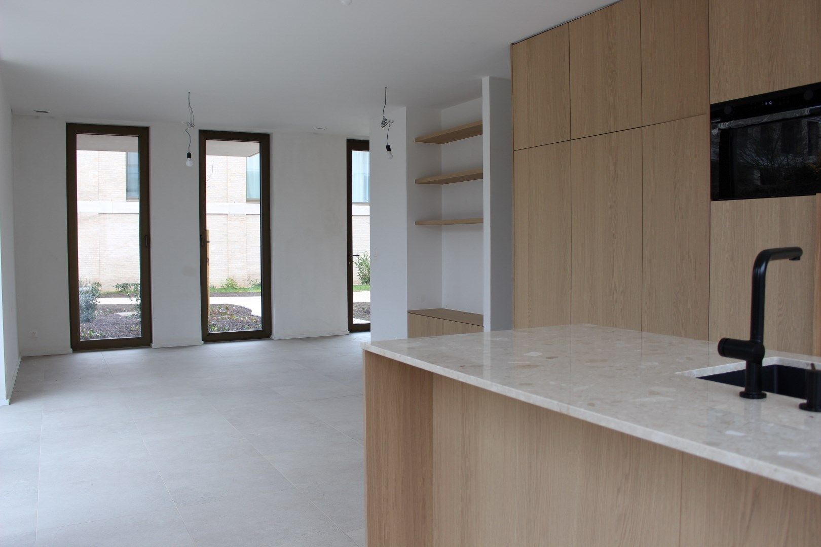 Nieuwbouw-gelijkvloers appartement met groot terras foto 9