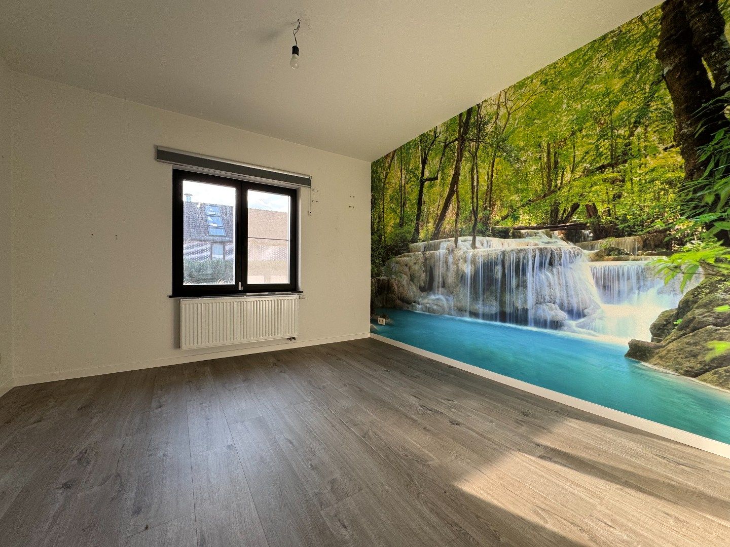 een instapklare 4-gevelwoning met tuin foto 10