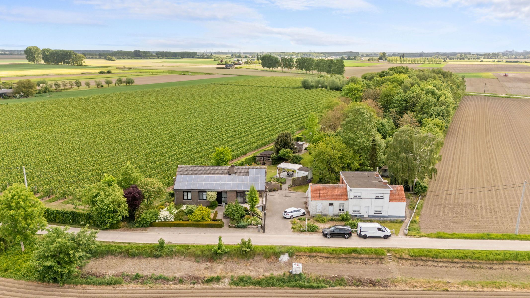 Open bebouwing met 360° landelijk zicht en 2 garages foto 27