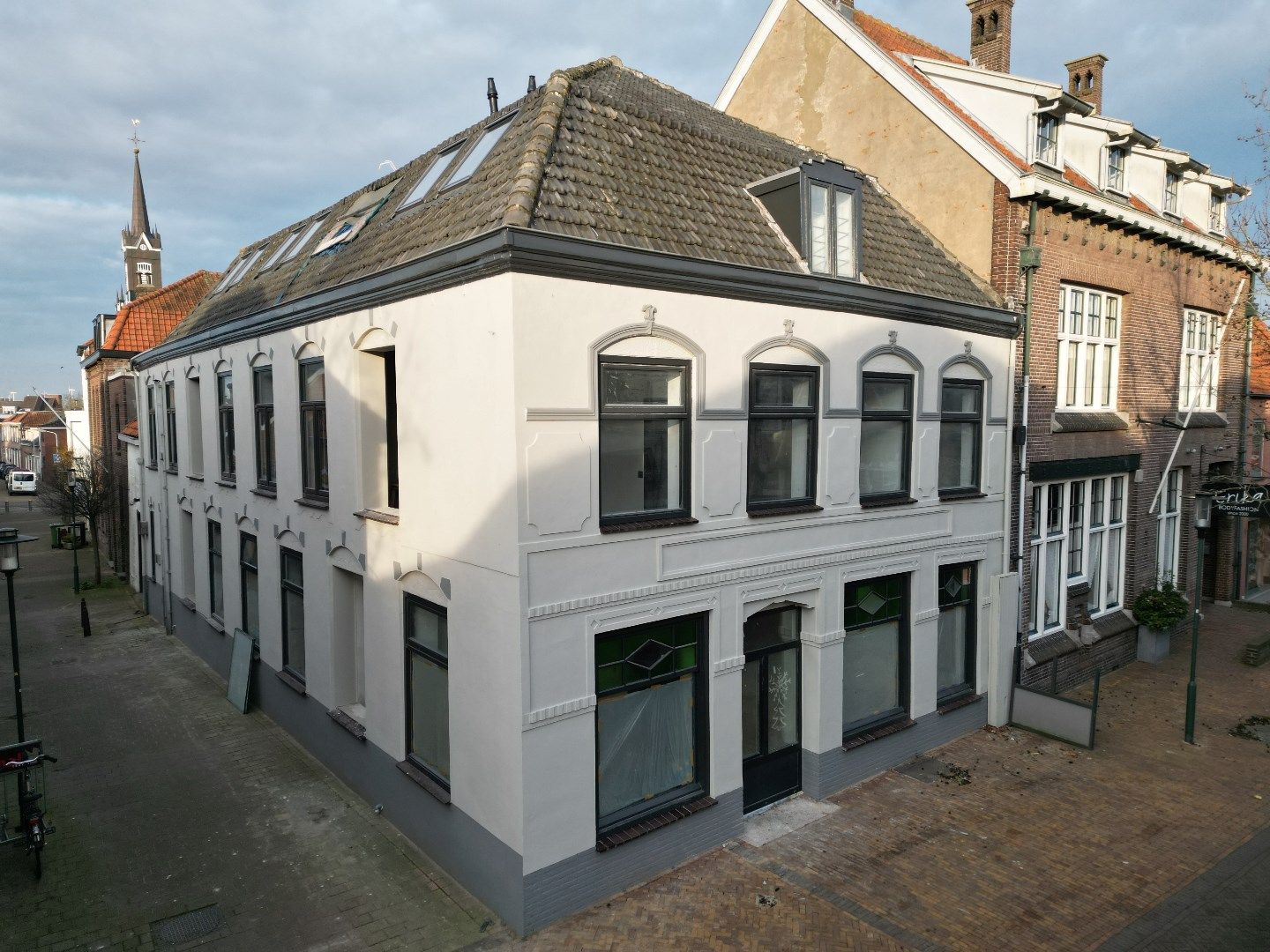 Wonen in de winkelstraat van Axel foto {{pictureIndex}}