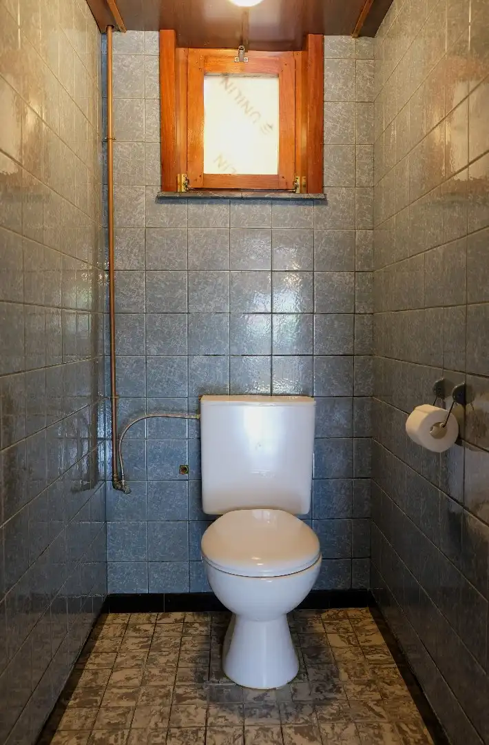 Ruime woning met garage, bijgebouwen en tuin en veel potentieel voor extra slaapkamers foto 8