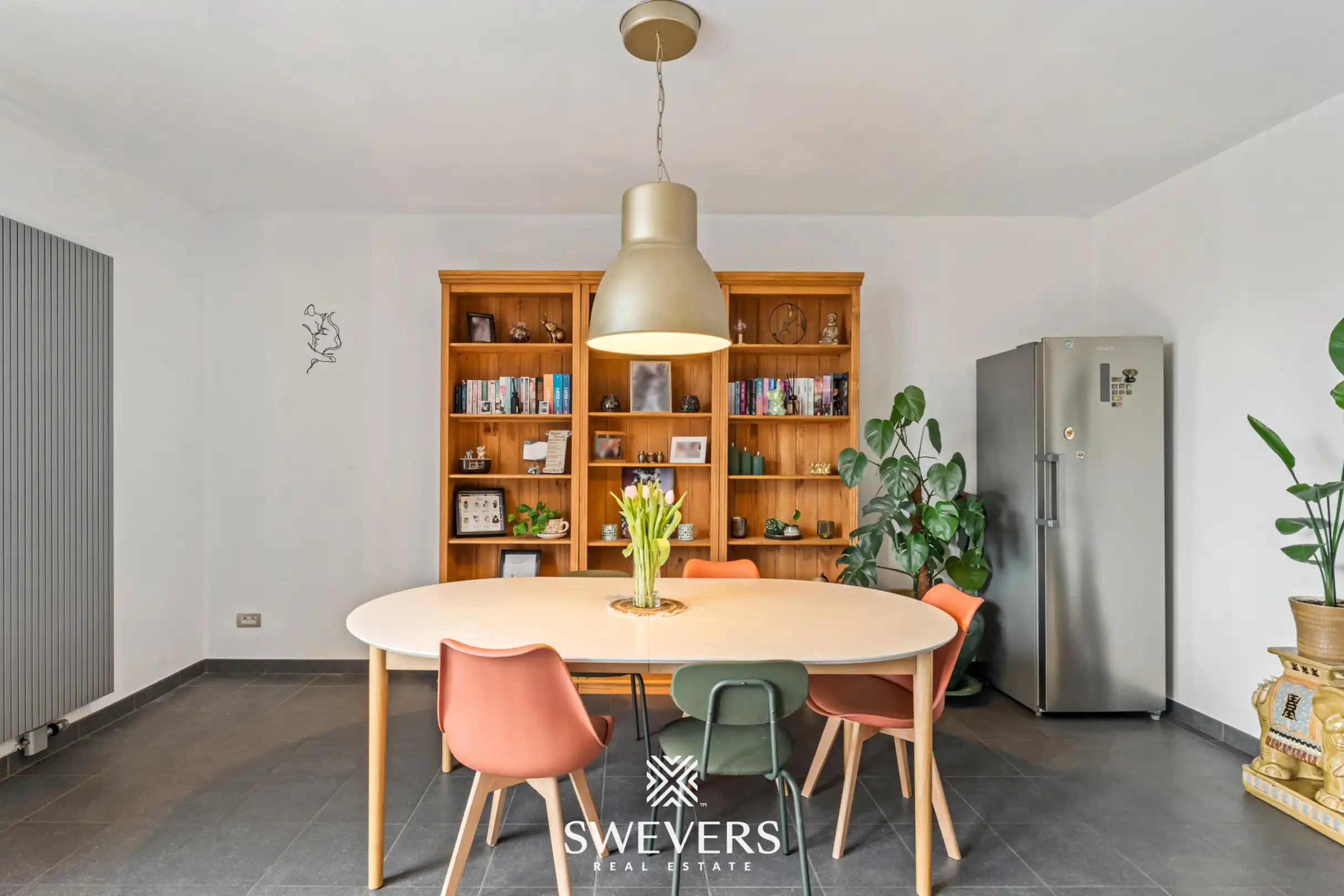 Zonnige bel-etage met dubbele garage en groot terras vlakbij het centrum van Heusden foto 10