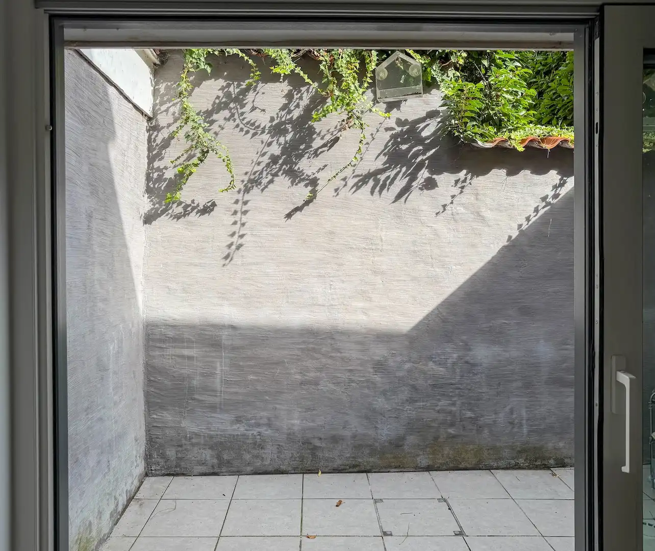 toffe gerenoveerde stadswoning met groene patio op Sint-Anna foto 12