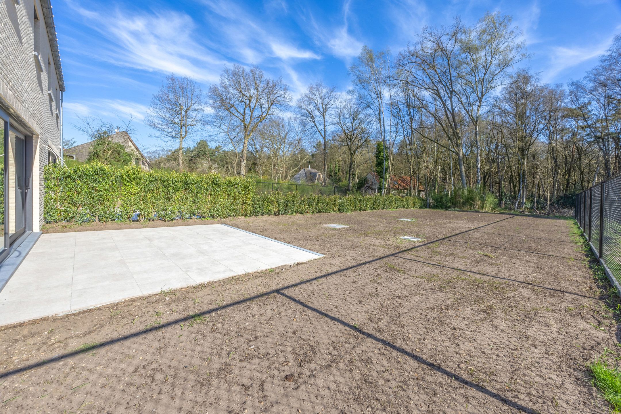 Stijlvolle nieuwbouwkoppelwoning met adembenemend boszicht foto 15