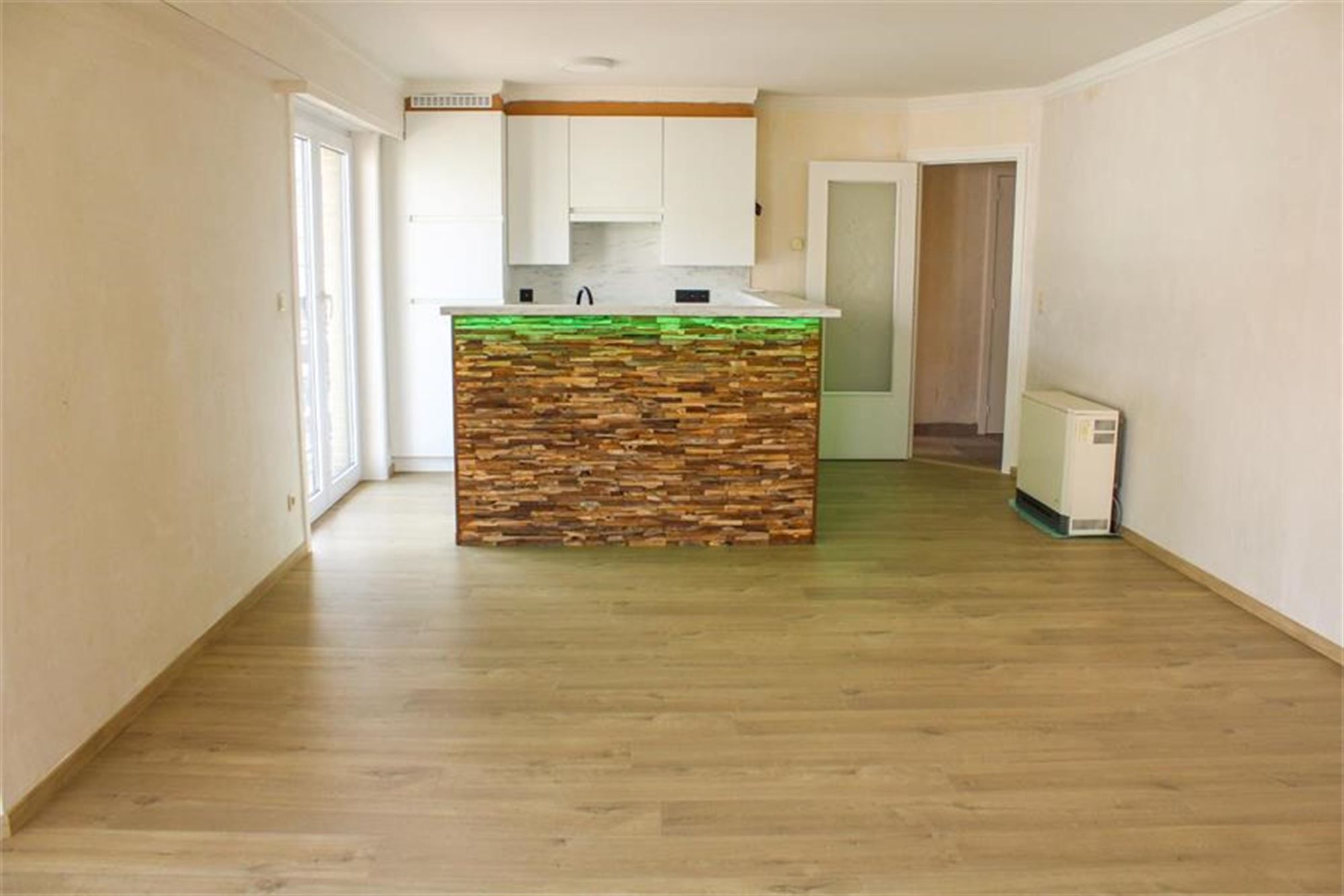 Zonnig en instapklaar hoekappartement vlakbij strand en winkels! foto 3