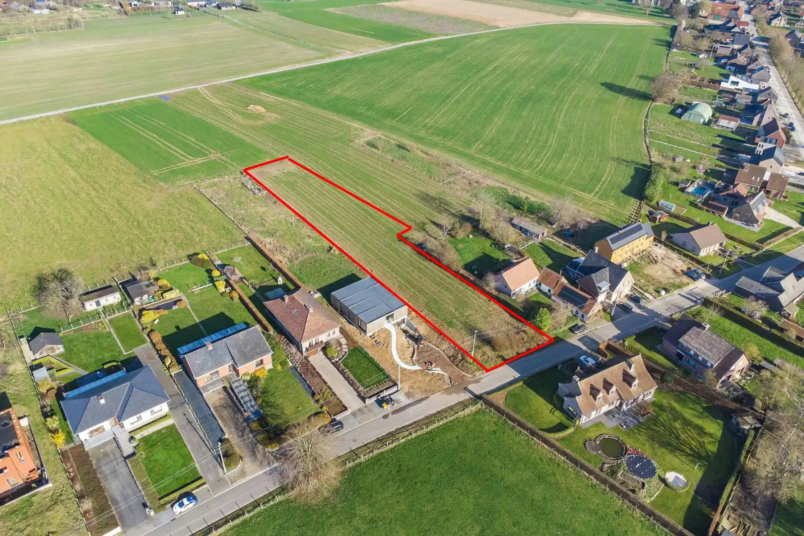 Unieke bouwgrond met verzicht te koop in Brakel foto {{pictureIndex}}