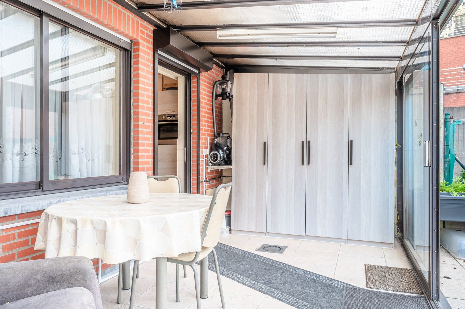 Gelijkvloers appartement met tuin foto 8