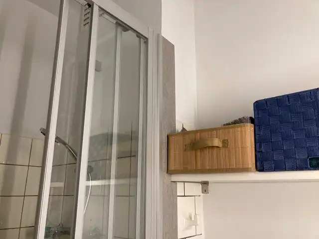Groot woonhuis op 3 verdiepingen, bestaande uit 2 appartementen , met garage en grote tuin .  foto 17