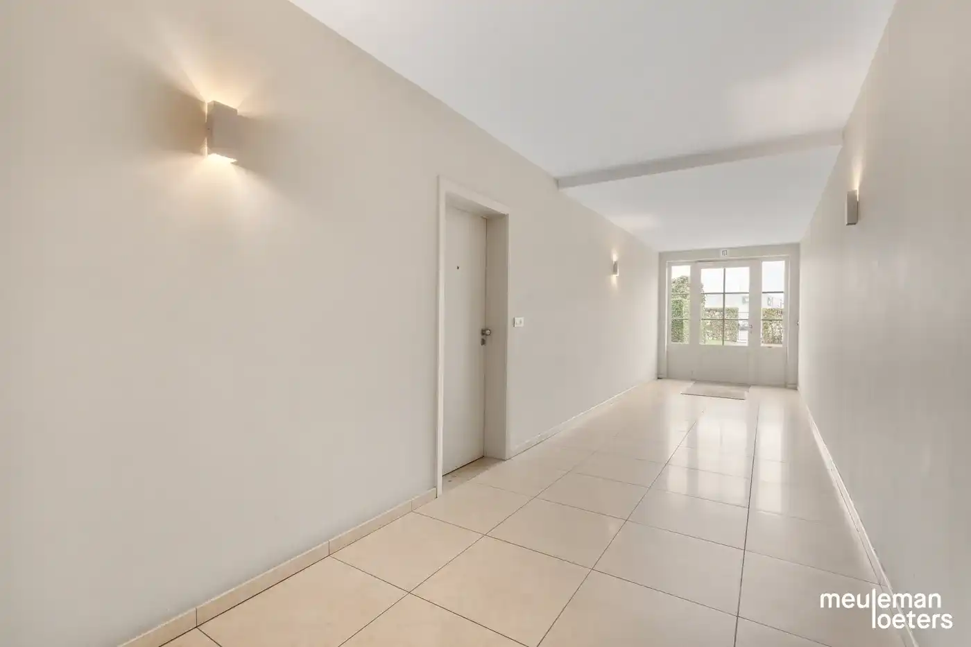 Riant en instapklaar duplexappartement met zéér ruime garagebox in centrum  foto 17