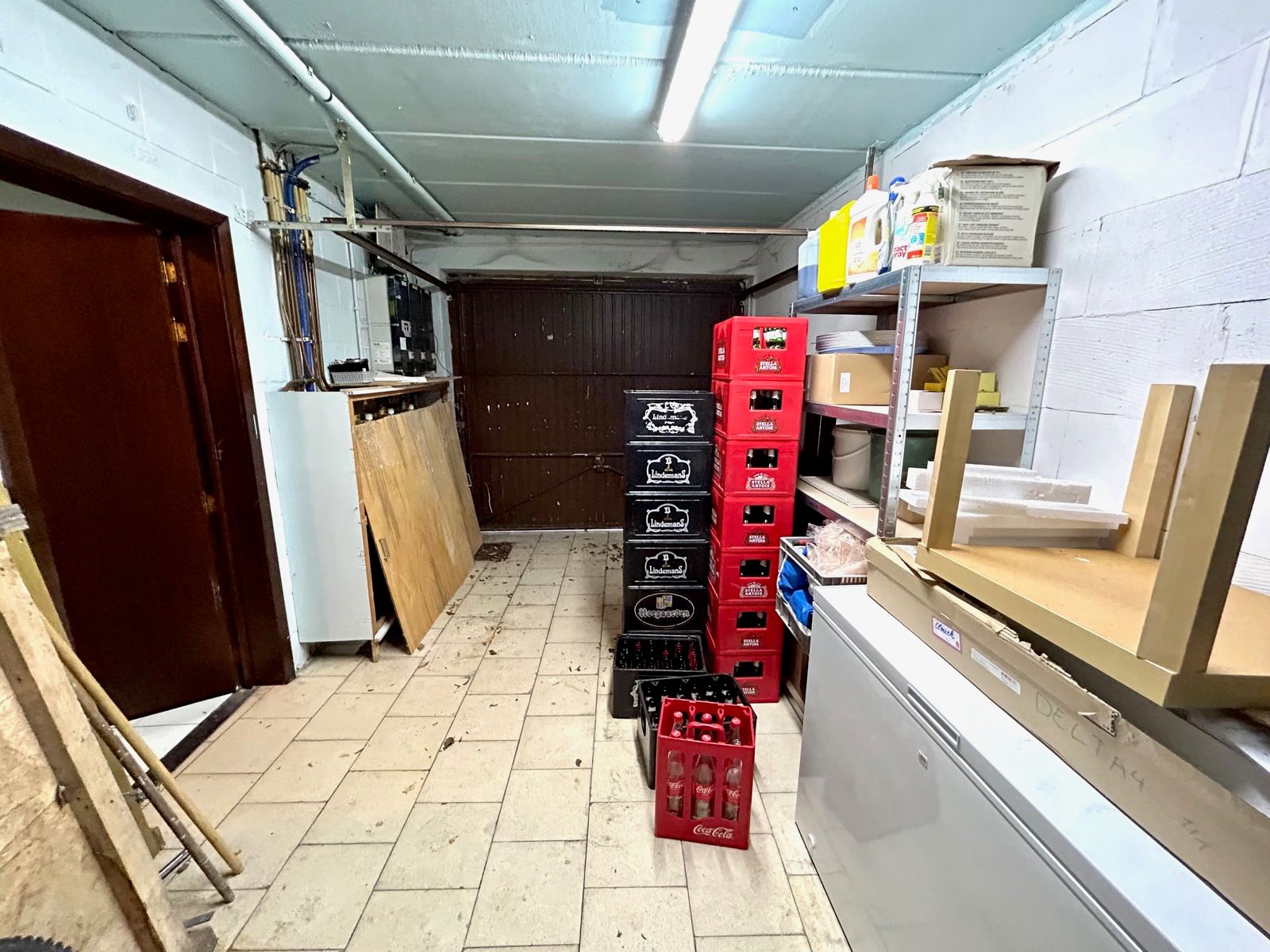 Opbrengsteigendom: handelspand, 2 appartementen en 2 garages foto 27
