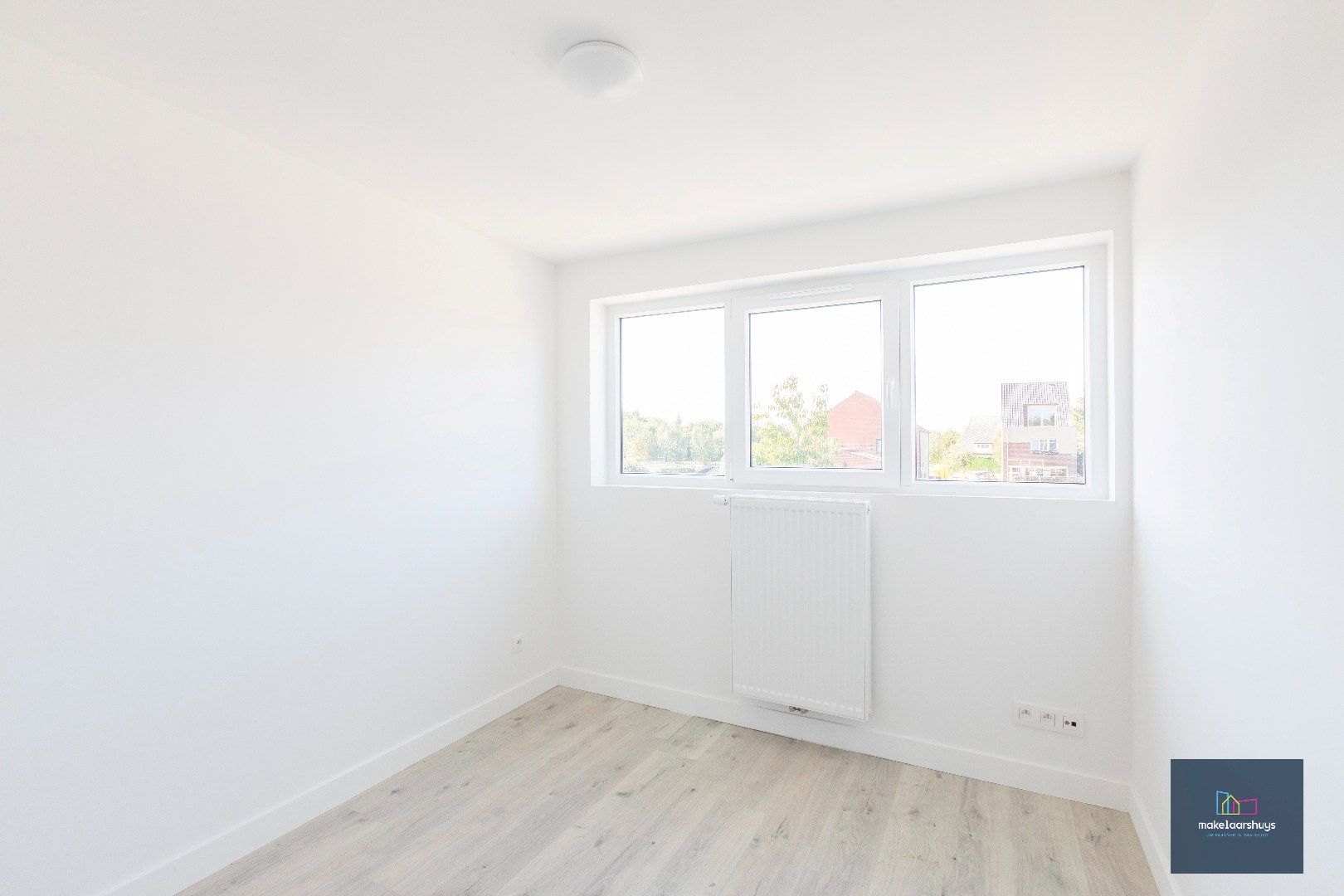 Instapklare energiezuinige woning met 3slpk tuin en staanplaats foto 12