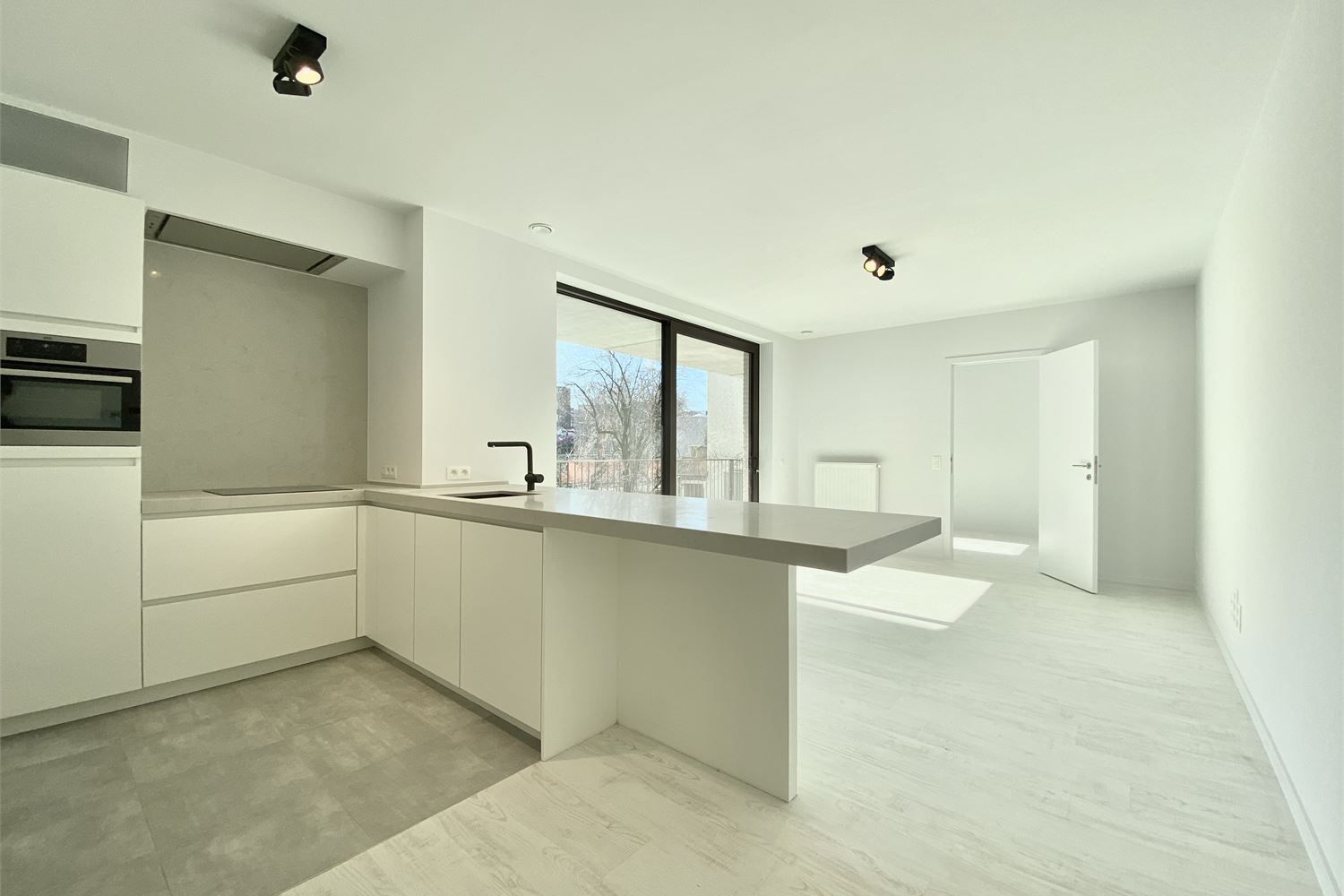 Modern éénslaapkamerappartement met topligging aan het Stadspark foto {{pictureIndex}}