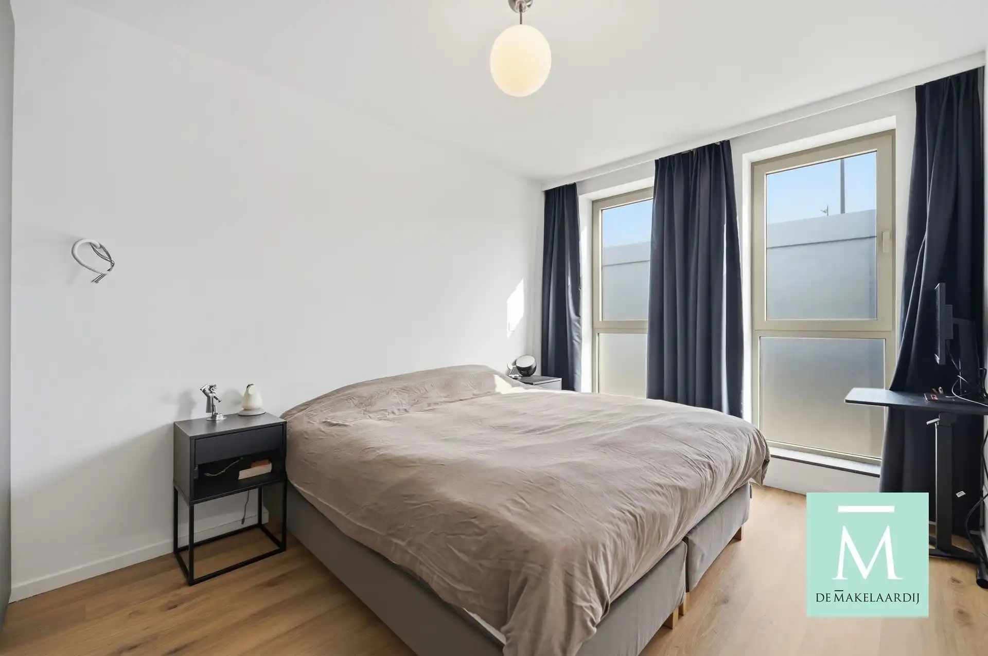 Instapklaar gelijkvloers appartement (2023) met zonnige tuin en laadpaal! foto 6