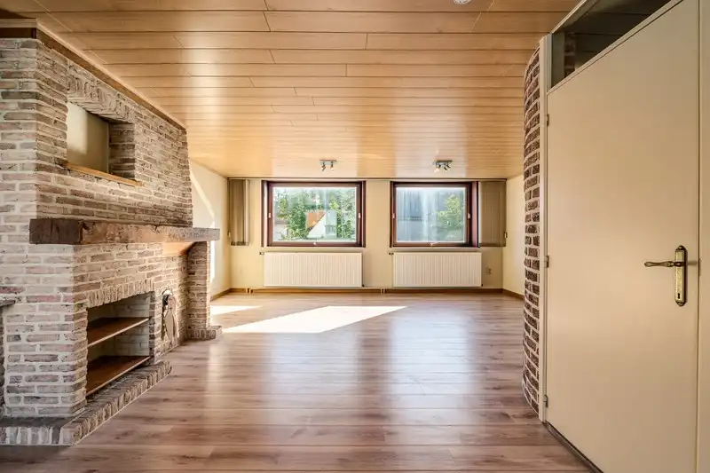 Op te frissen woning met perceel bouwgrond foto 9
