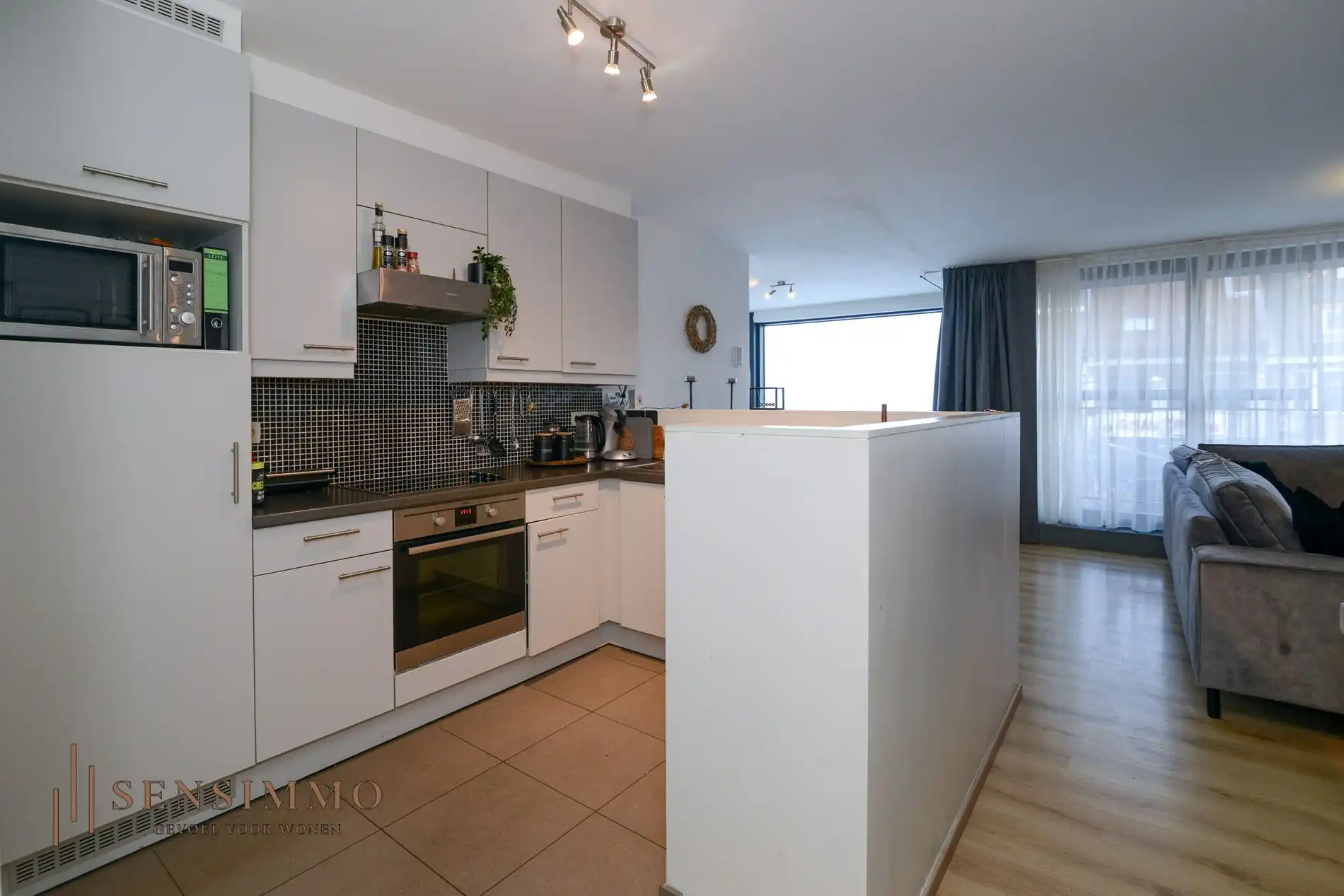 Instapklaar 2-slaapkamerappartement met dubbele terras in hartje Eisden foto 9