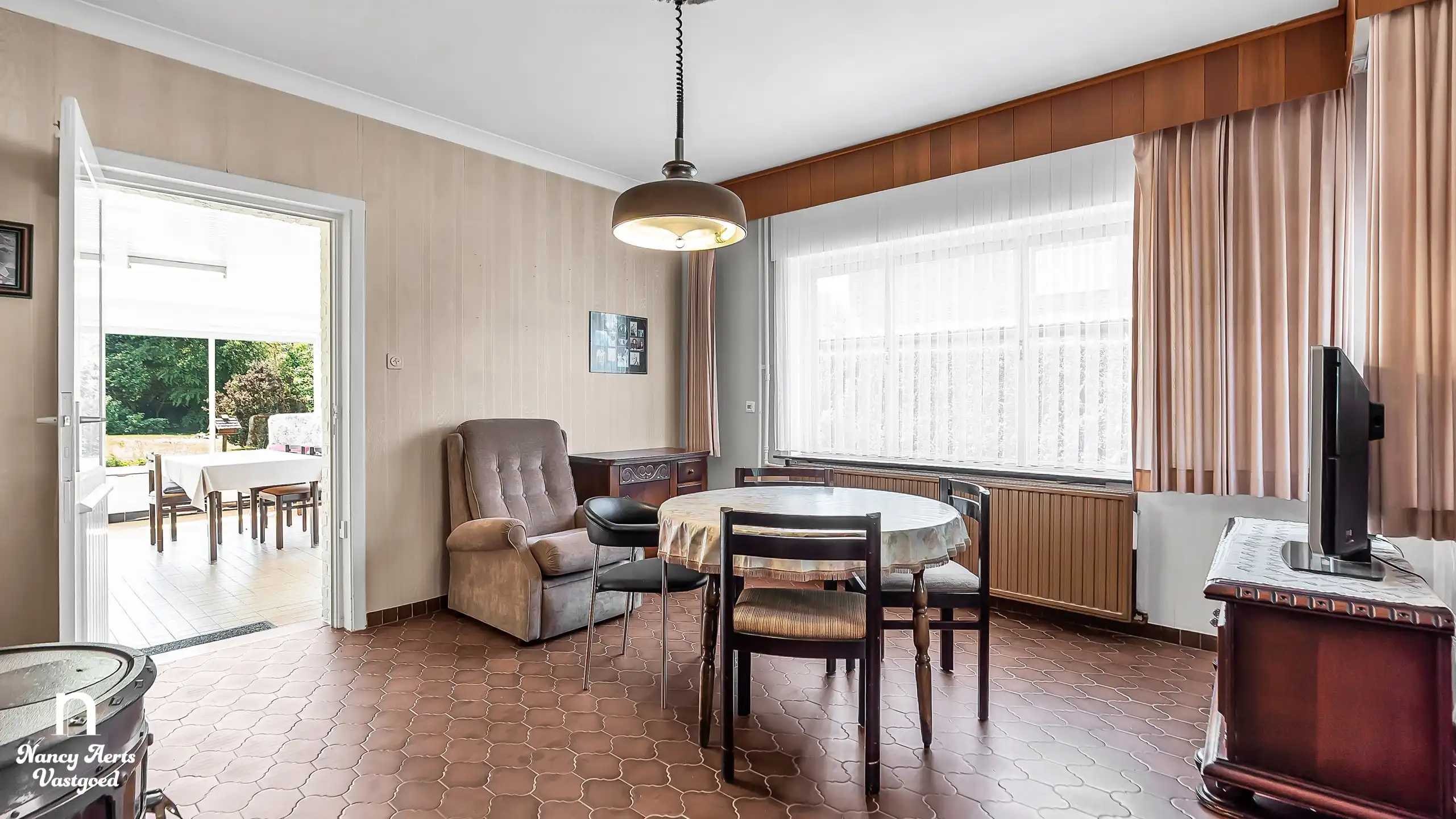 Woning op 1.287 m² met zuidtuin en renovatiepotentieel foto 9