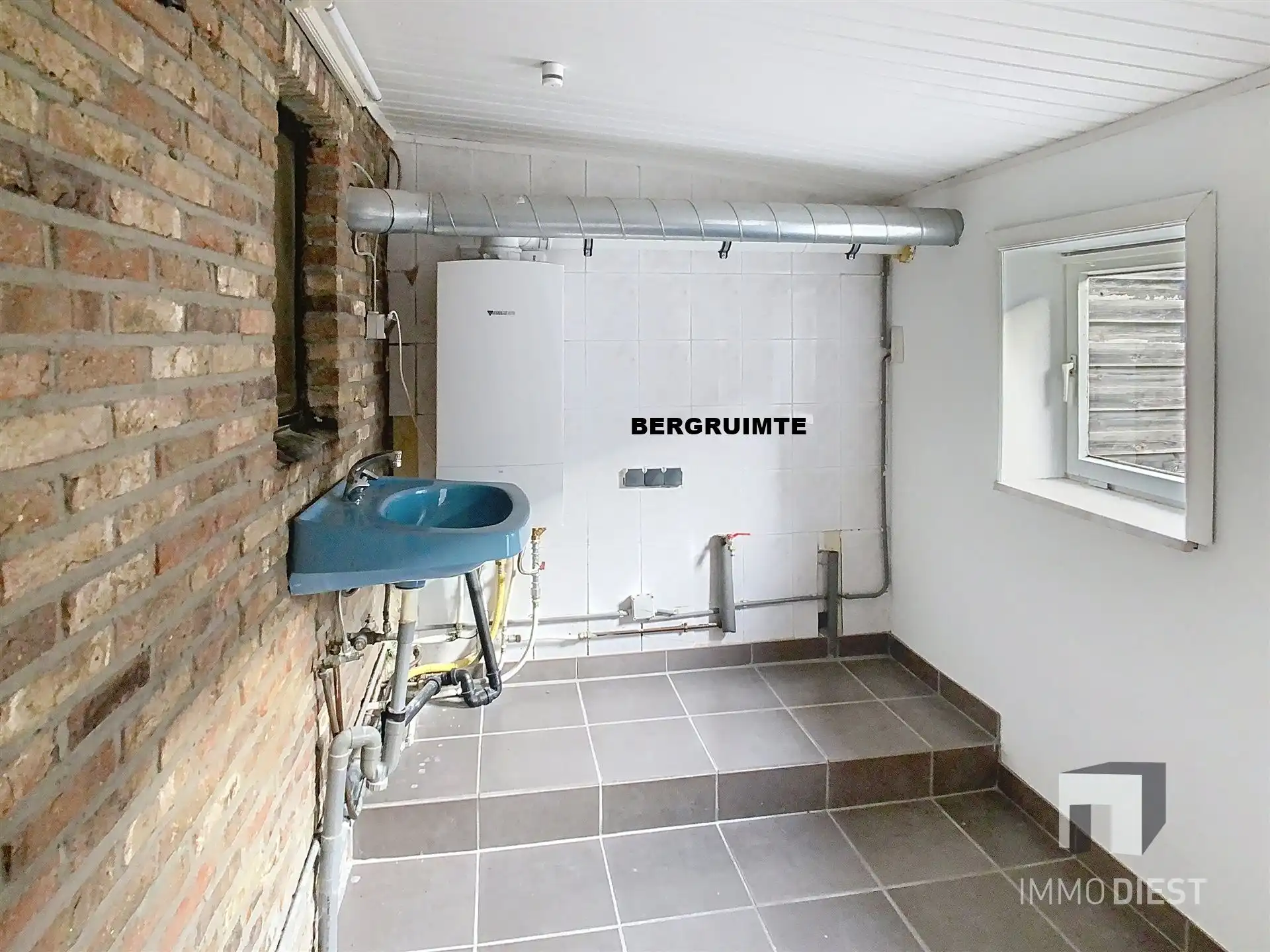 Gezellige rijwoning met terras en tuin foto 17