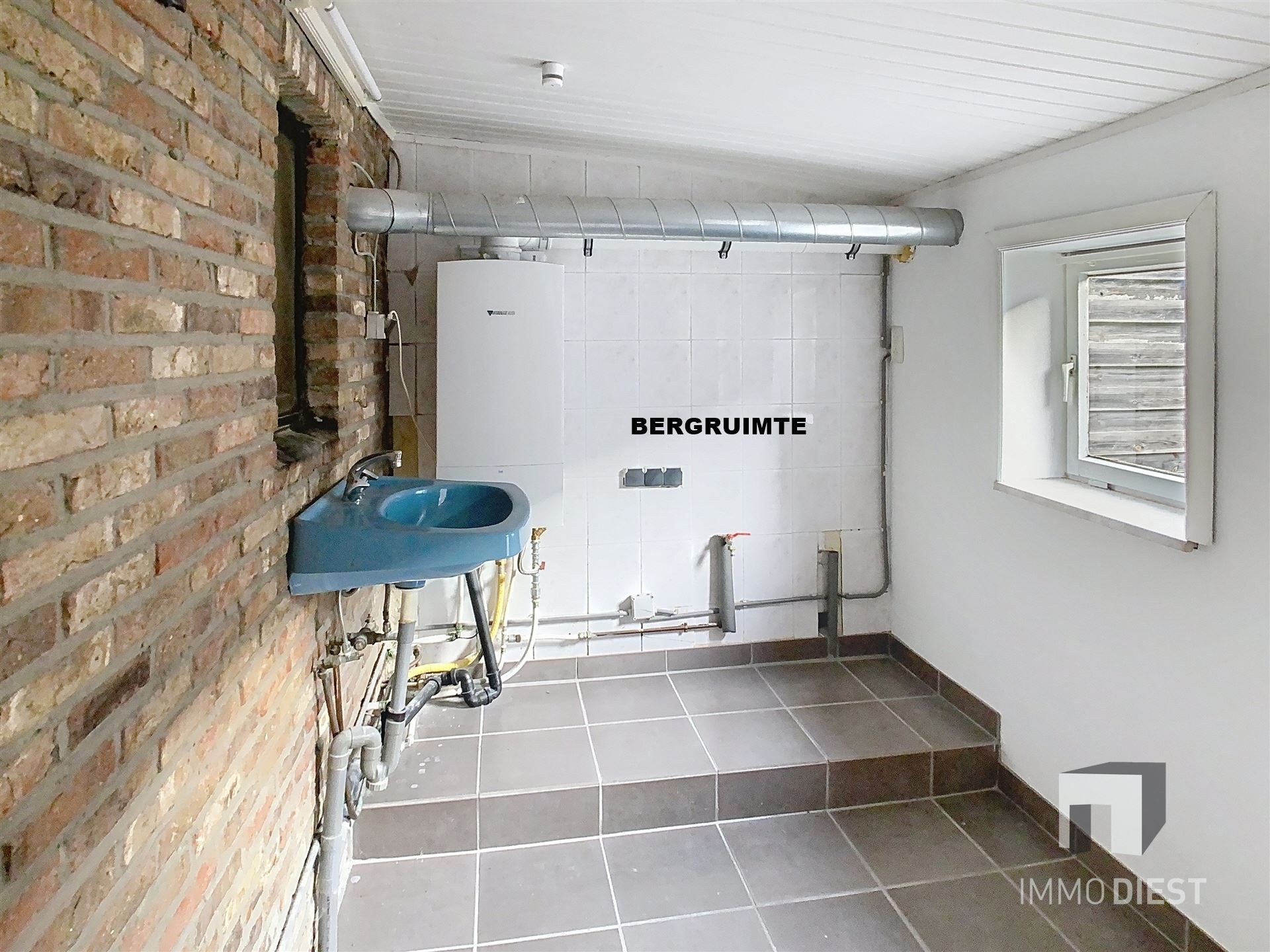 Gezellige rijwoning met terras en tuin foto 17