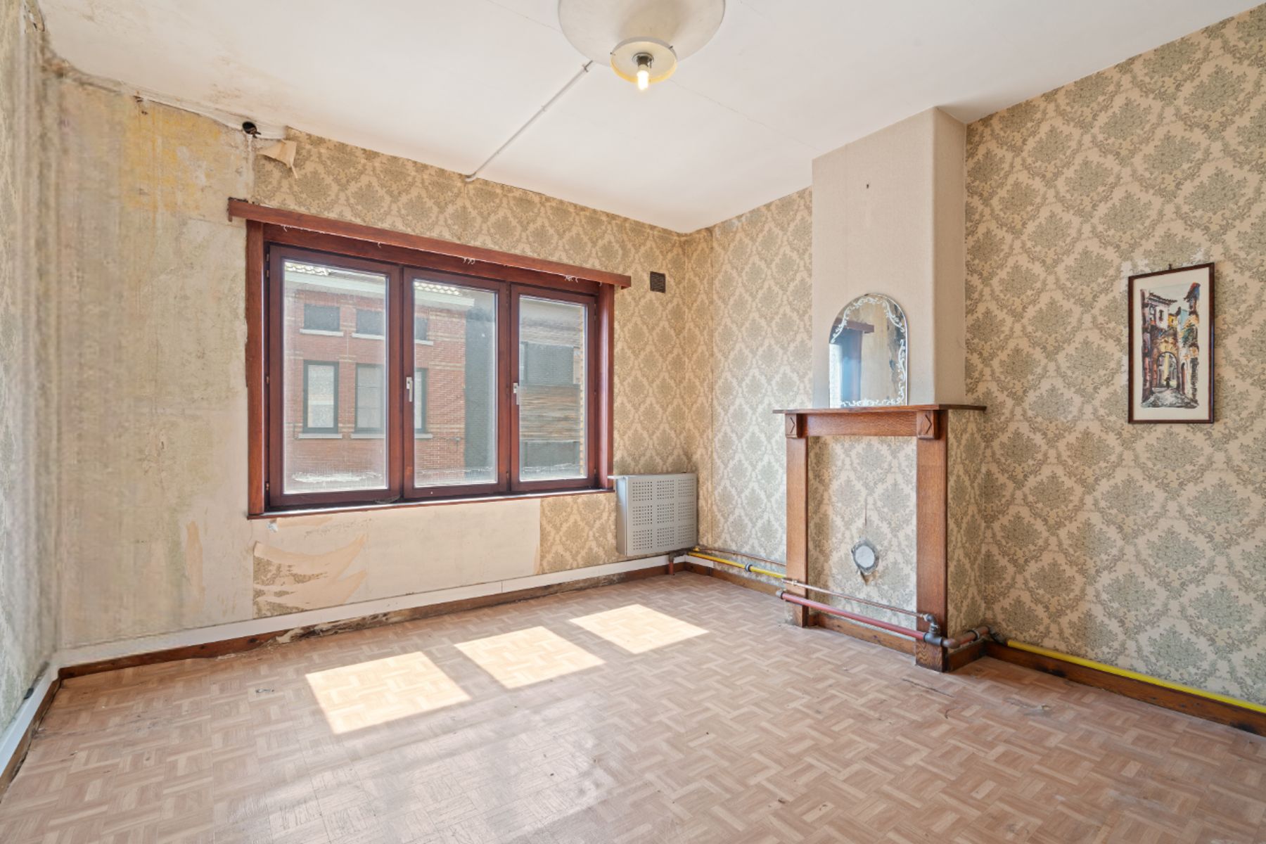 Te renoveren woning met tuin in Gentbrugge foto 11
