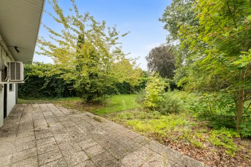 --- NIEUW&nbsp;--- Gelijkvloers appartement (191m²!) met prachtige zongerichte tuin (1329m²!) + garagebox. foto 17
