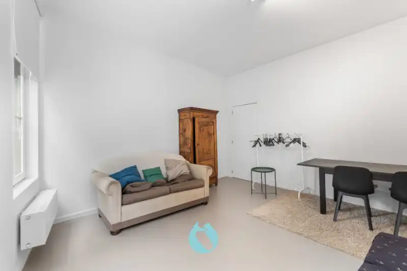 Instapklare stadswoning met 2 slaapkamers, bureauruimte en tuin foto 10