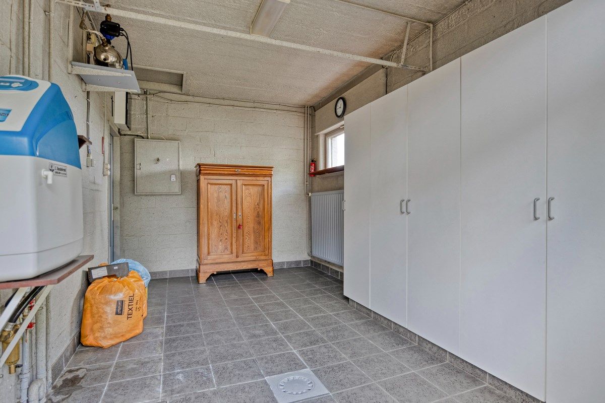 Ruime gelijkvloerse woning met zeer grote garage en leuke tuin te Tongeren  foto 25