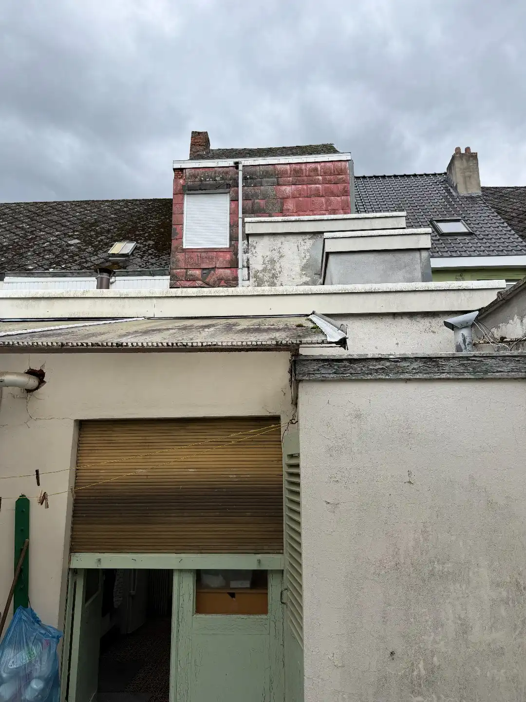 Te renoveren stadswoning met 4 slpk, koer en garage foto 29