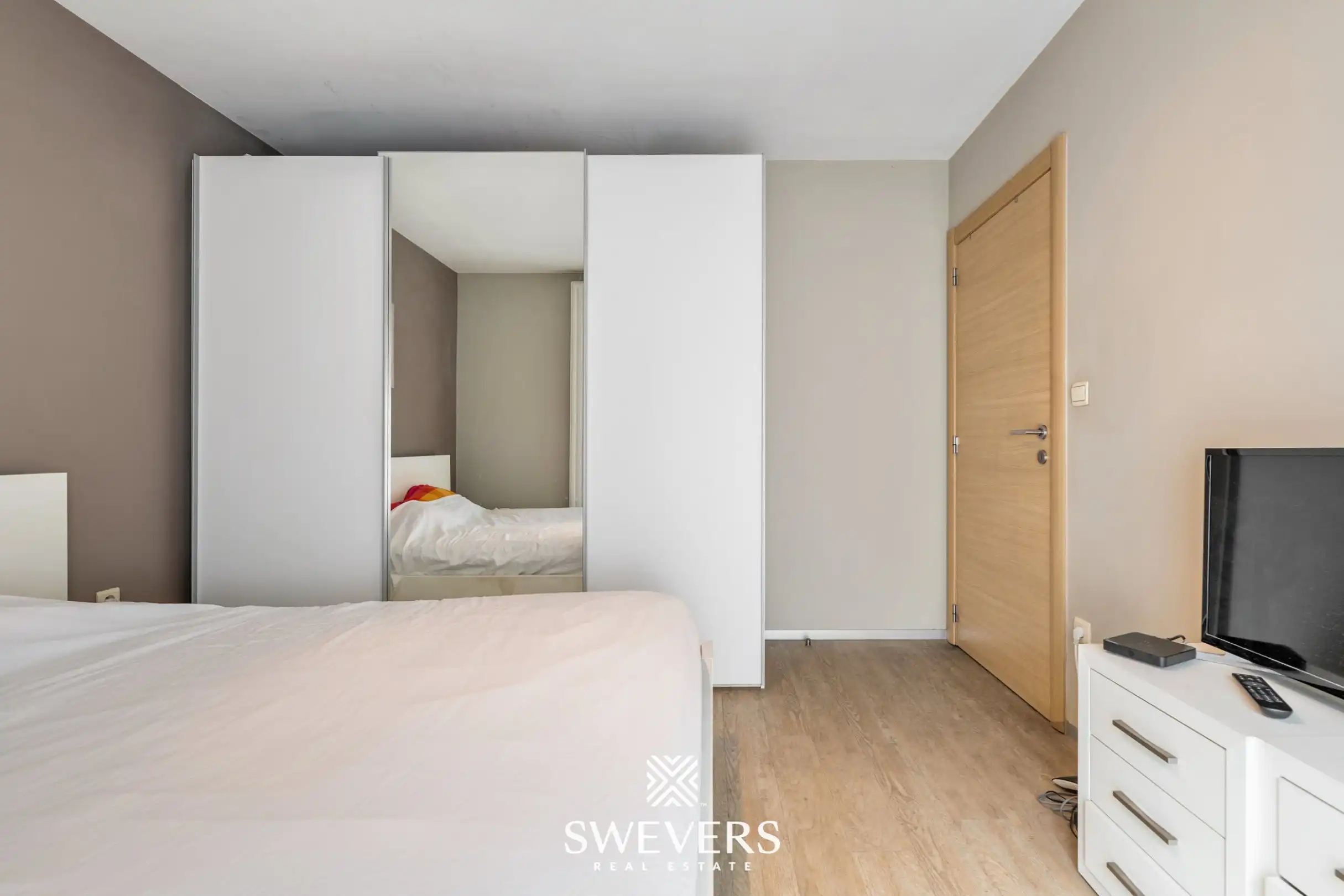 Uitstekend gelegen appartement met 2 slaapkamers, private tuin en ondergrondse staanplaats foto 6