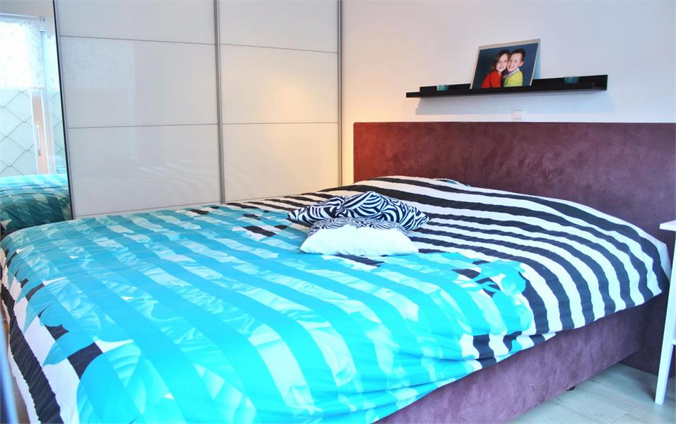 Mooi gelijkvloers appartement met terras en garagebox! foto 6