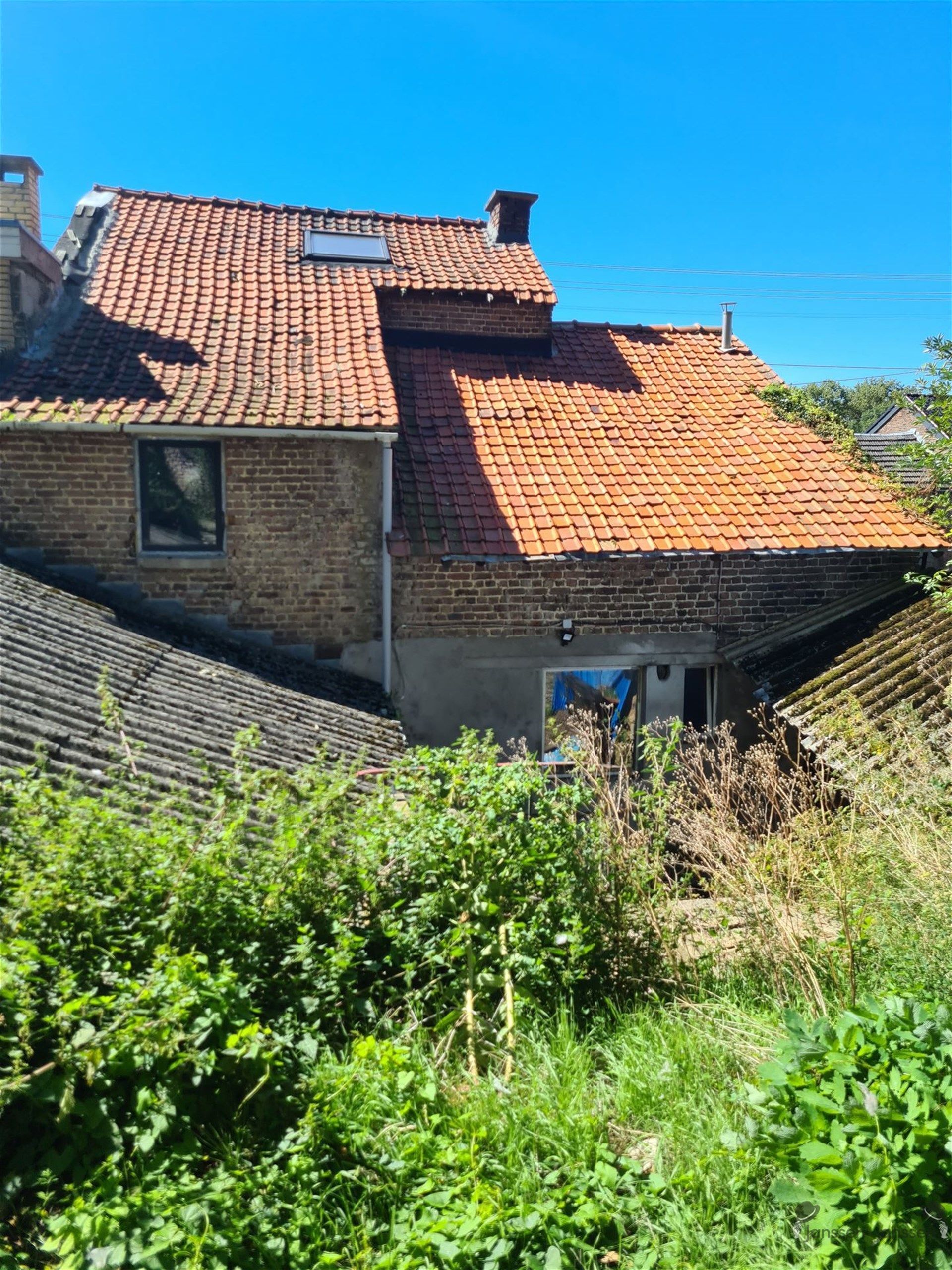 Op te knappen woning met veel potentieel in Tongeren foto 14
