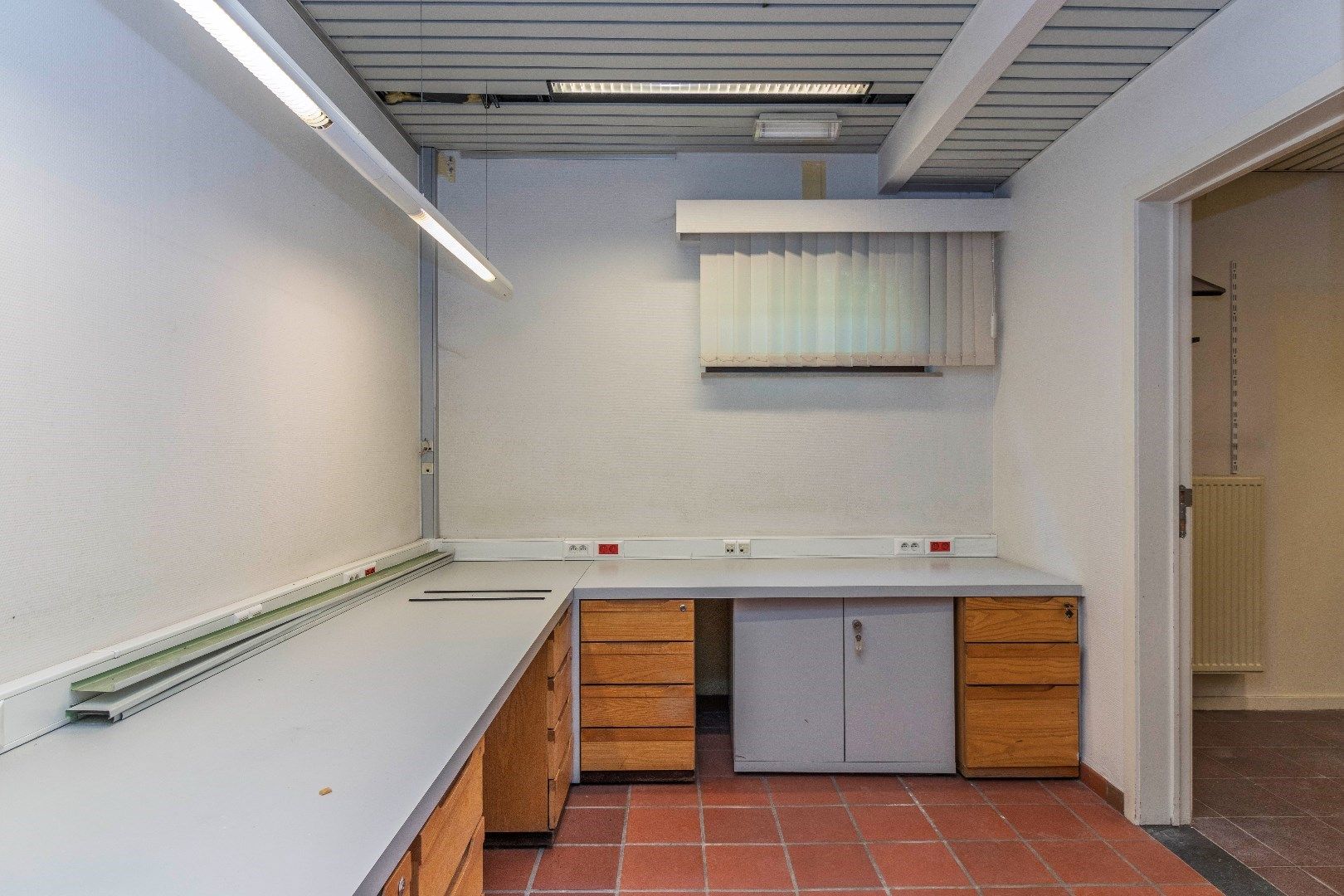 Ruim duplexappartement met gelijkvloerse handelsruimte foto 26