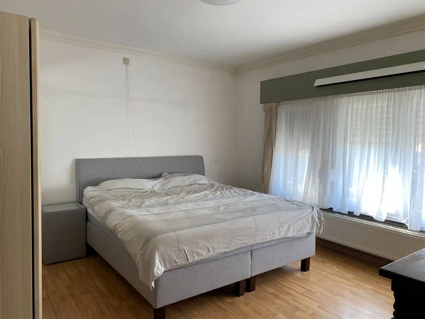 Halfopen woning met grote tuin en garage op ideale ligging foto 7