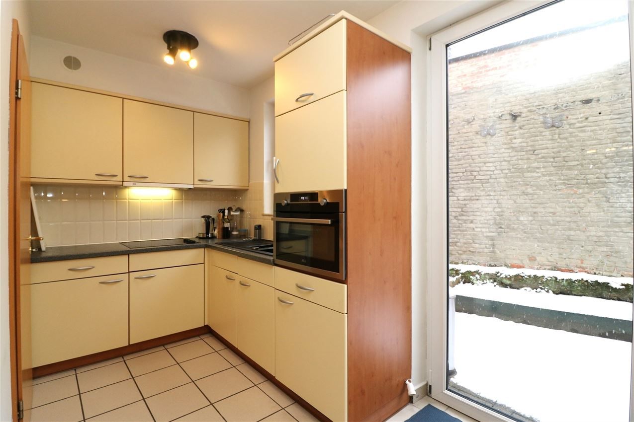 Centrale, zeer gezellige stadswoning met 2 slpk. en koer foto 10