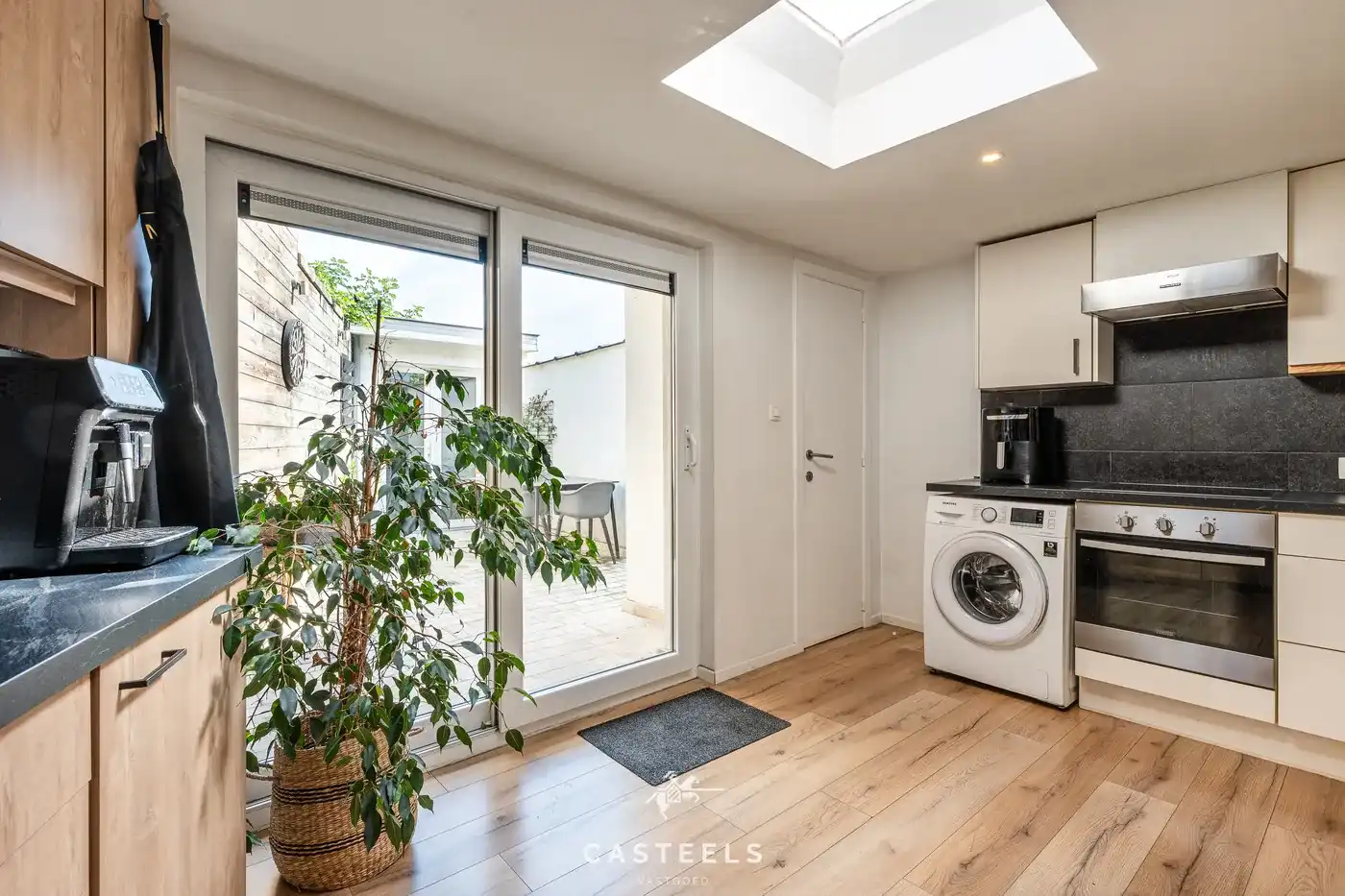 Karaktervolle starterswoning met tuin in Gentbrugge foto 10