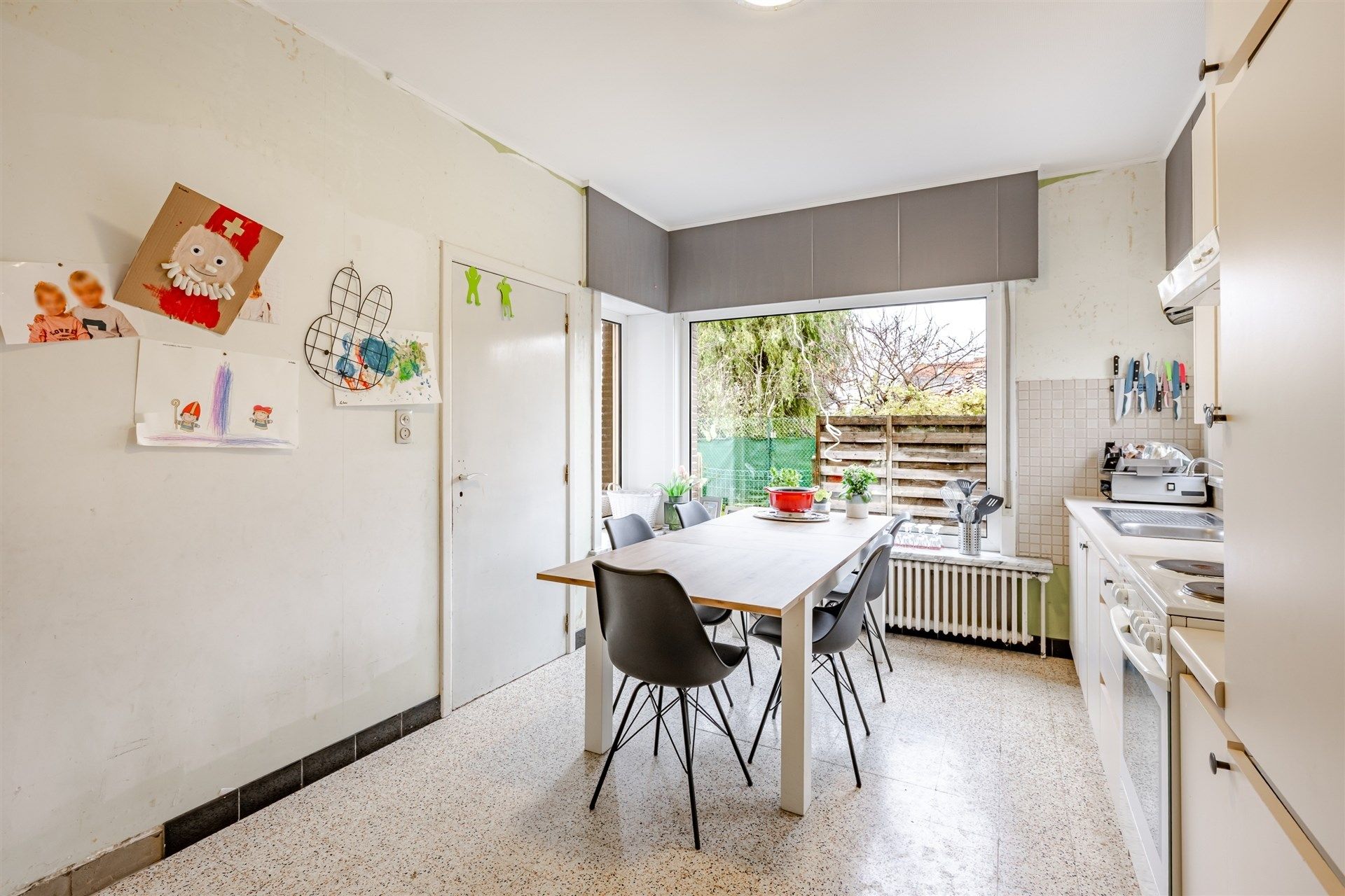 Op te frissen woning met supertoffe tuin, nabij het centrum! foto 8