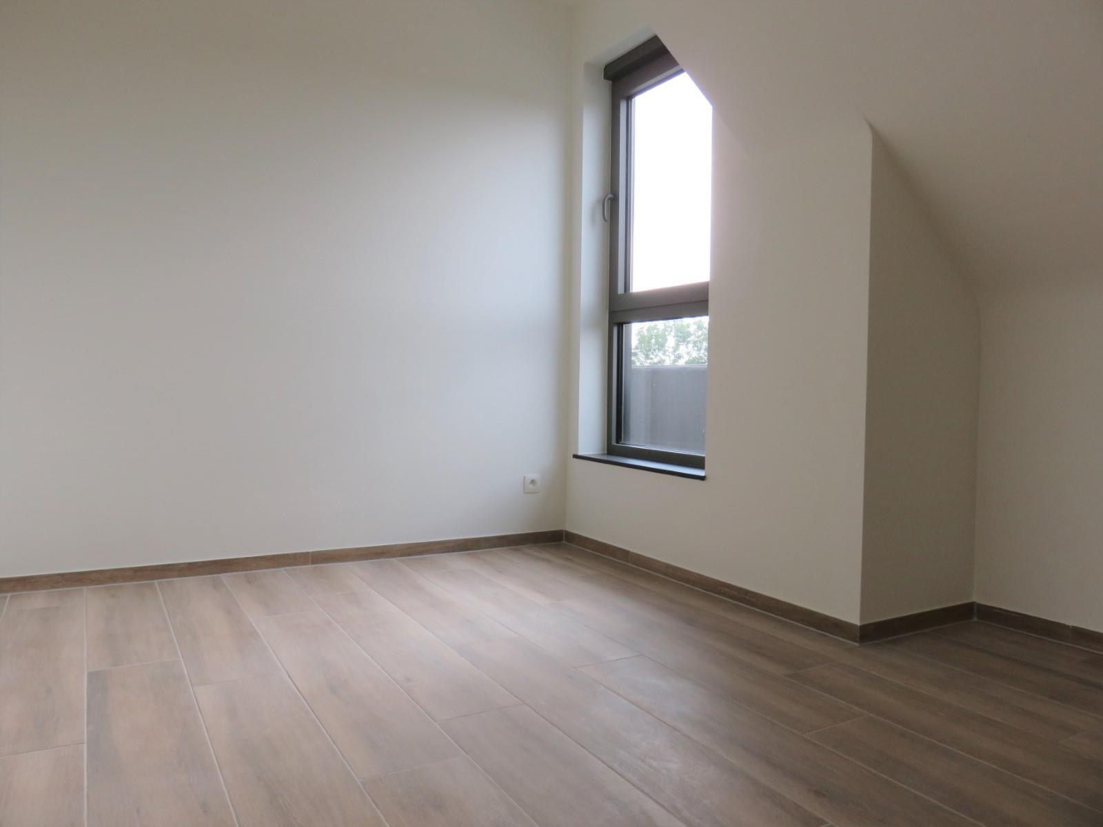 Dakappartement met 2 slaapkamers, terras en autostaanplaats! foto 13
