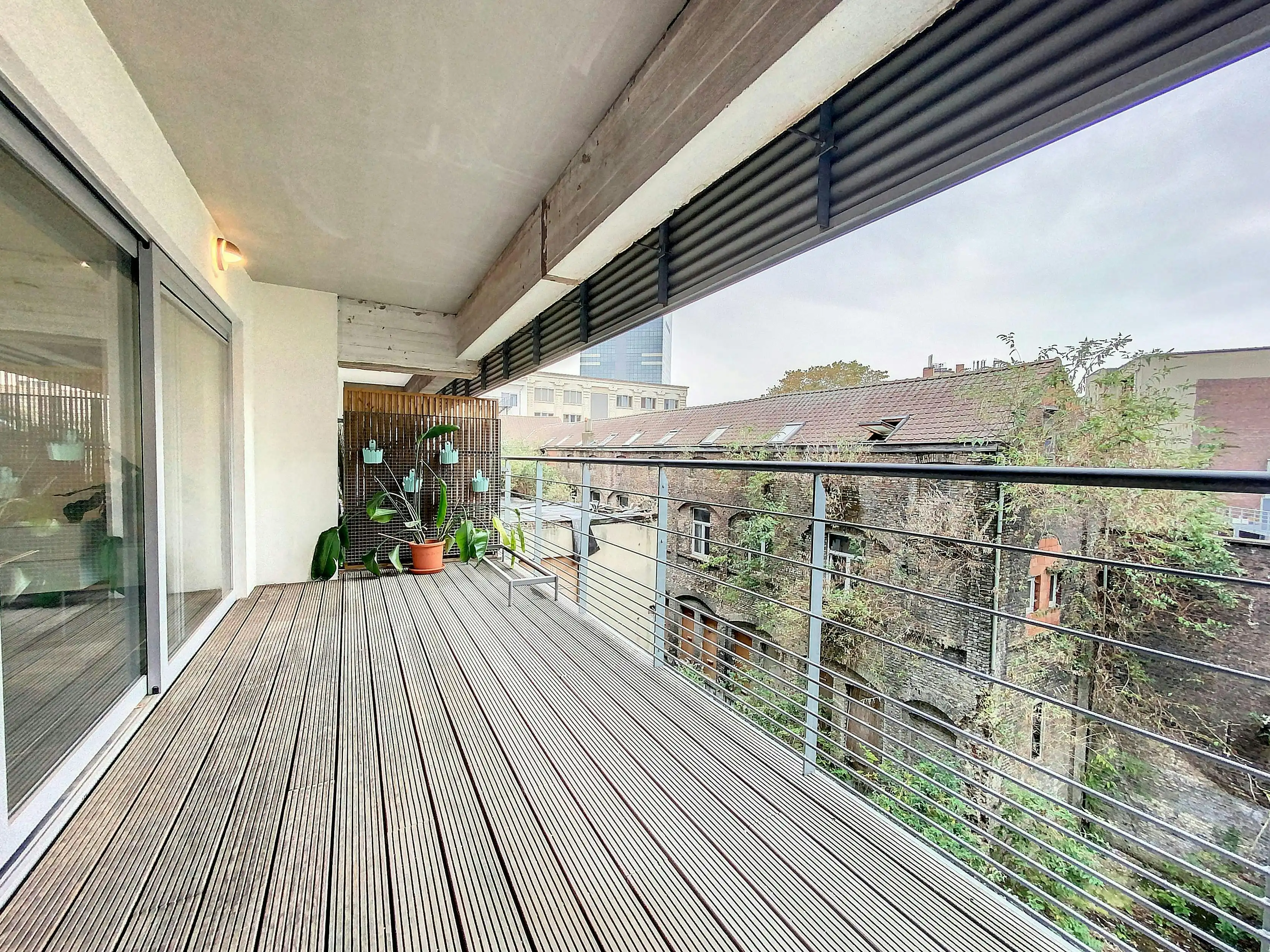 Loft nabij Zuidstation Sint-Gillis met 2 slaaphoeken/-kamers foto 4