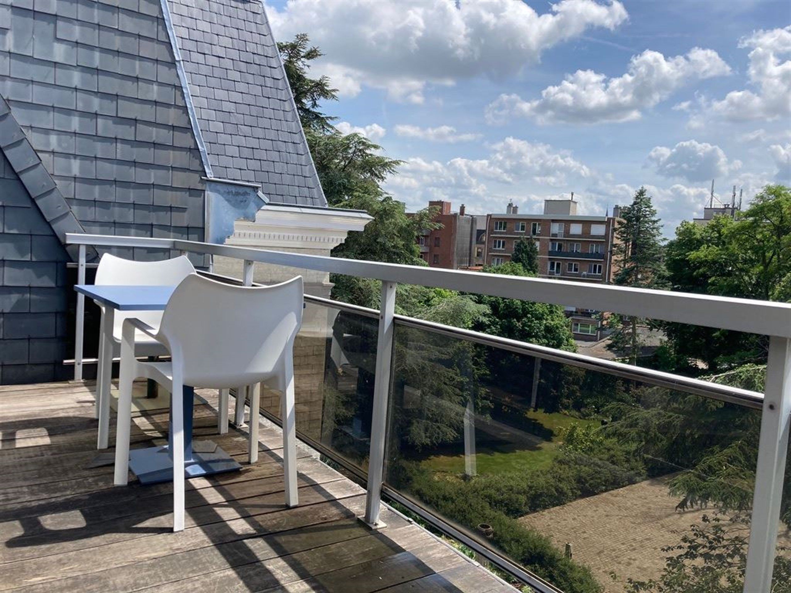 Zalig wonen onder de zon: dakappartement met autostaanplaats foto 2