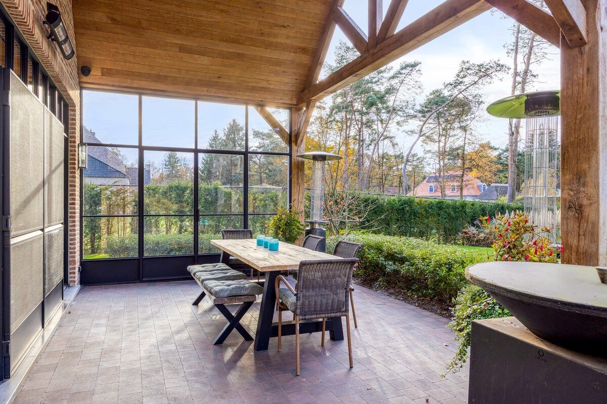 Ruim ingedeelde en kwalitatief afgewerkte villa op een mooi perceel met naastgelegen bouwgrond. foto 13