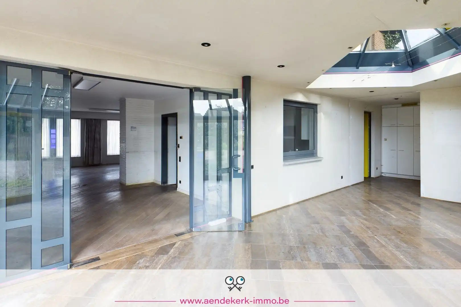 Woning met handelsruimte in het centrum van Kinrooi foto 11