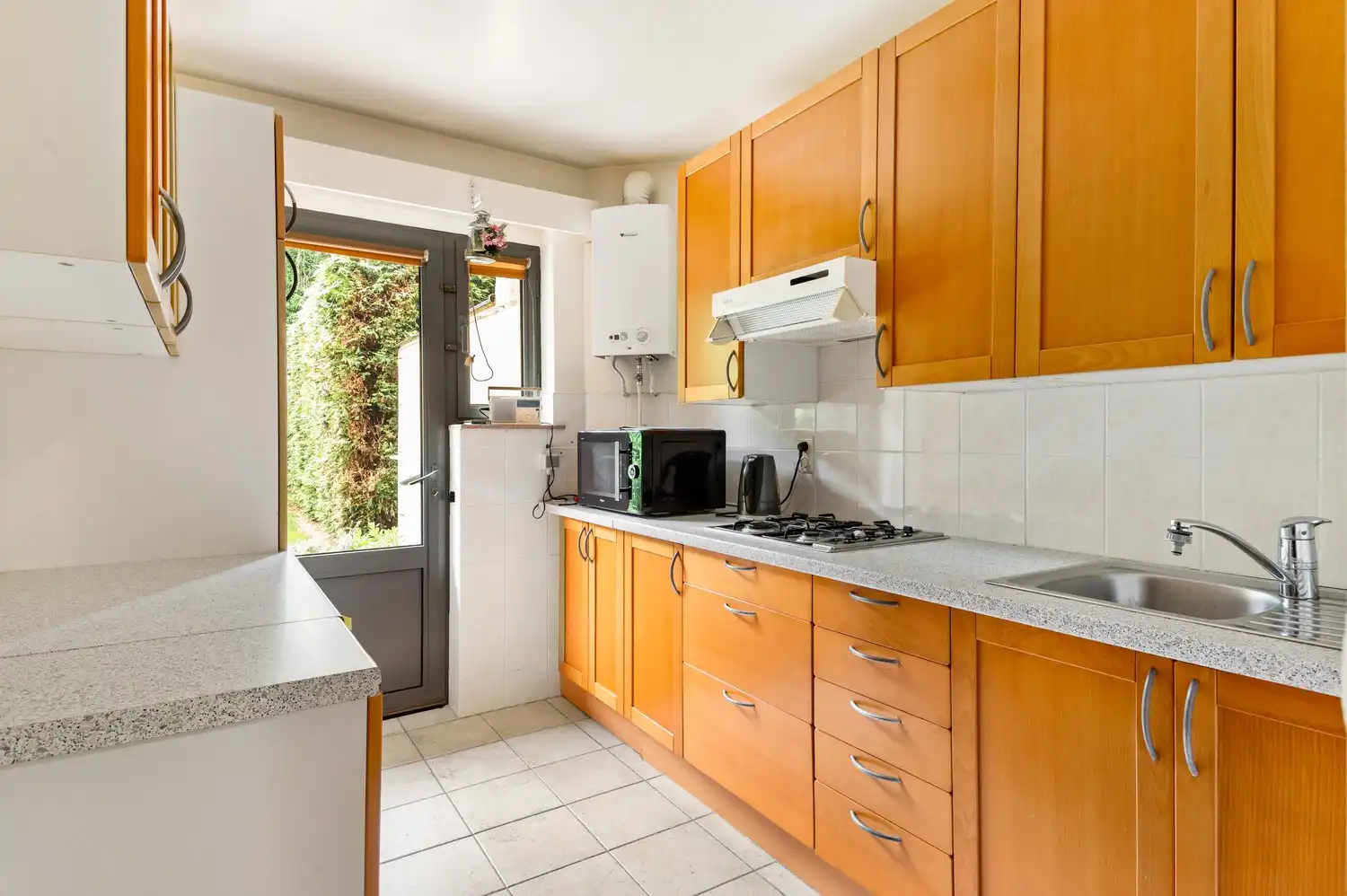 Instapklaar gelijkvloers appartement met zonnige tuin op rustige ligging in Deurne. foto 6