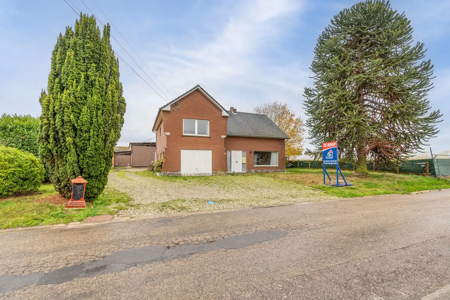 Te renoveren woning met loodsen op rustige locatie! foto 22