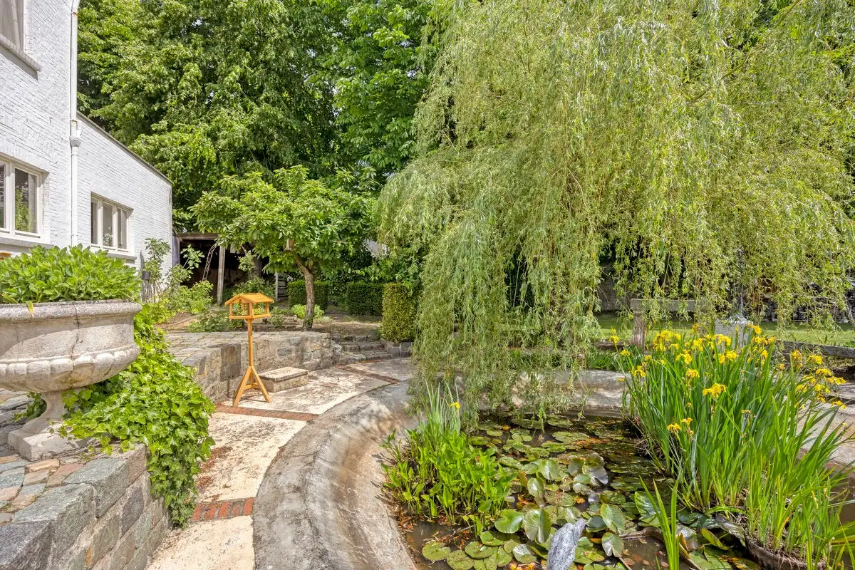 Bijzonder historisch herenhuis te koop in Heppen foto 52
