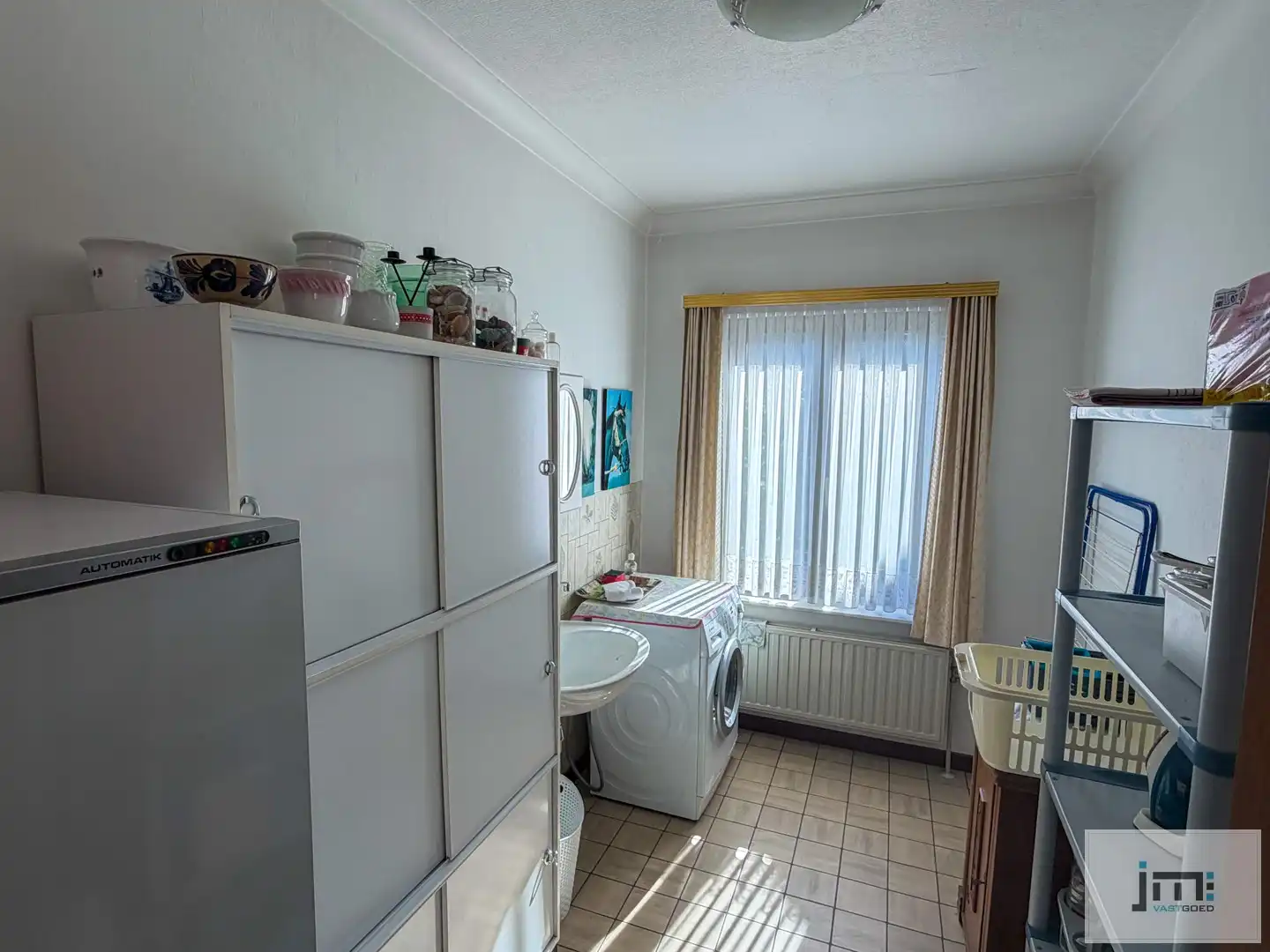 Gelijksvloerse woning foto 11