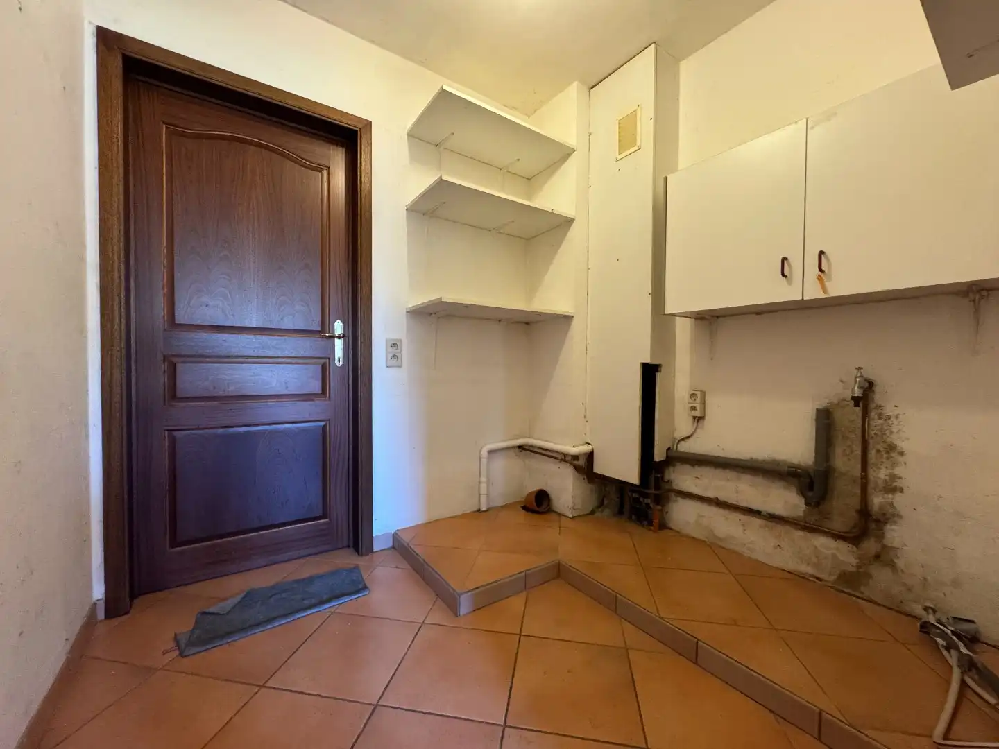 Een ruime 3-gevelwoning met tuin en garage foto 7